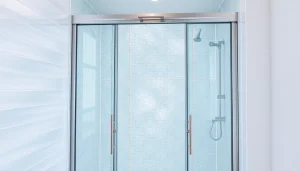 Showcasing a sleek shower screen door in a modern bathroom with elegant features.